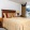 bedroom with nightstands and a large window